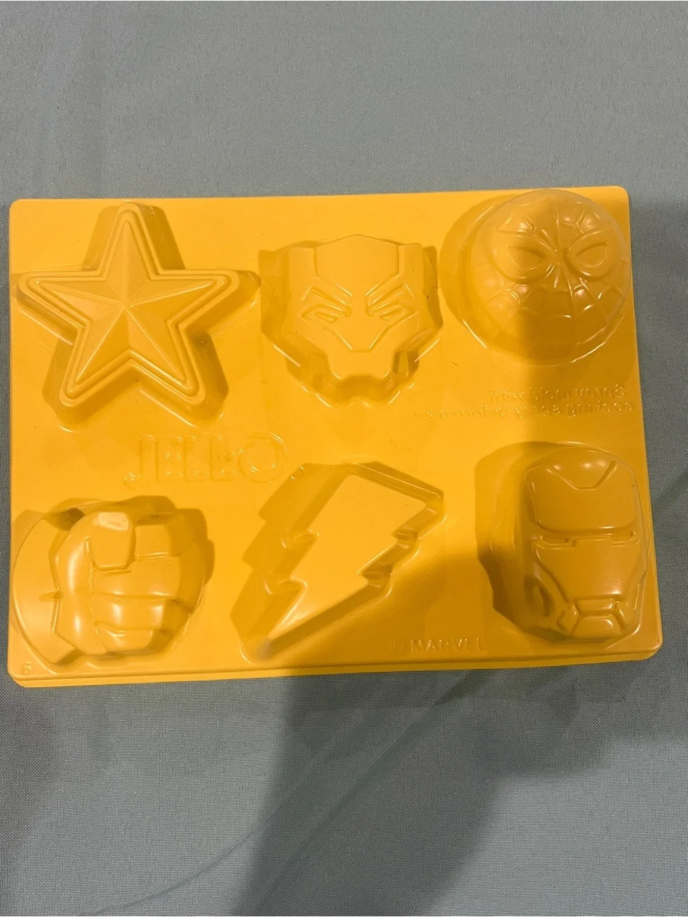 Silicone Football and 2 superhero molds set of 3 items